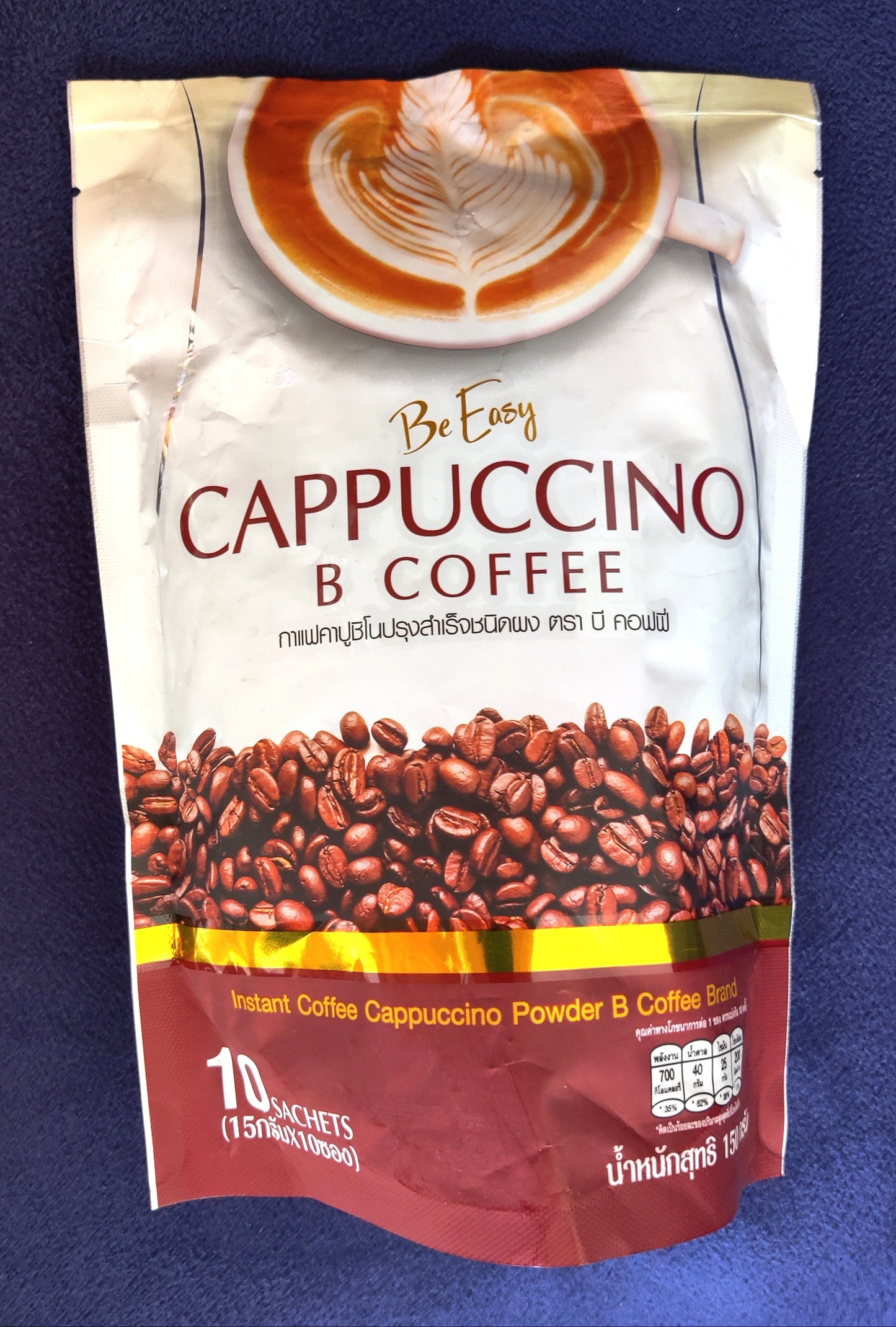 Cappuccino and coffee package on a blue background