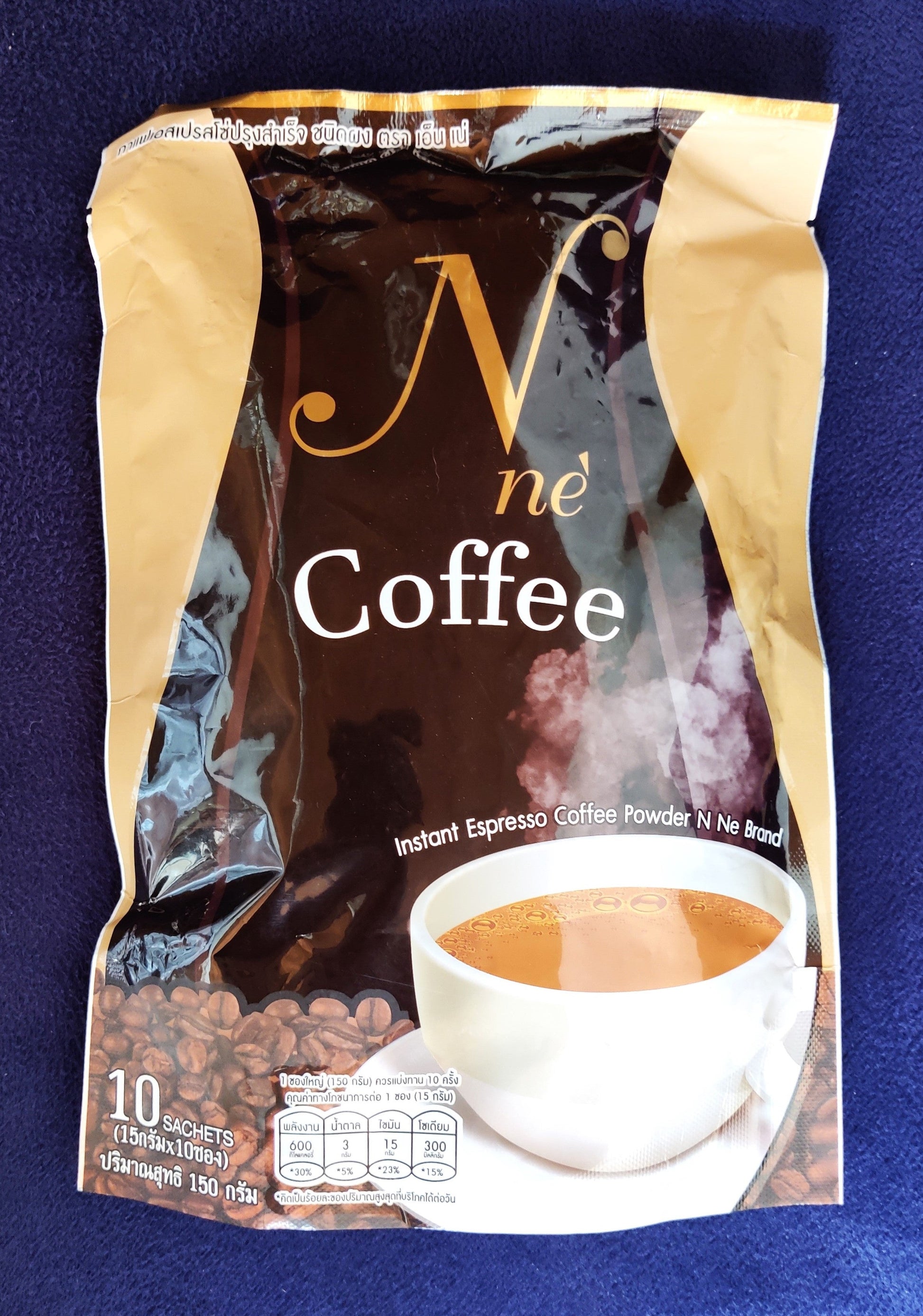 Coffee package with a cup and beans on a blue background