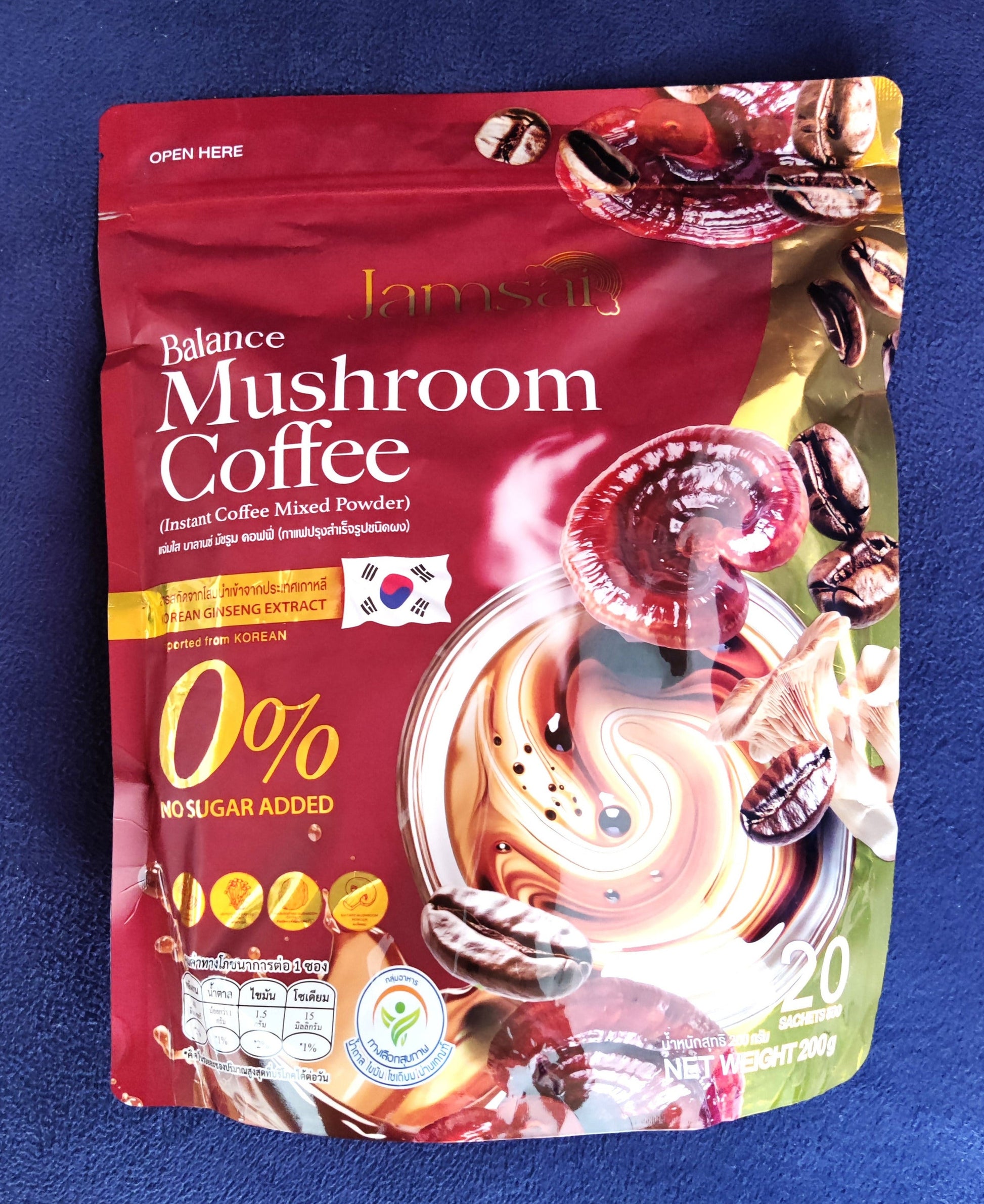 Package of Balance Mushroom Coffee on a blue background