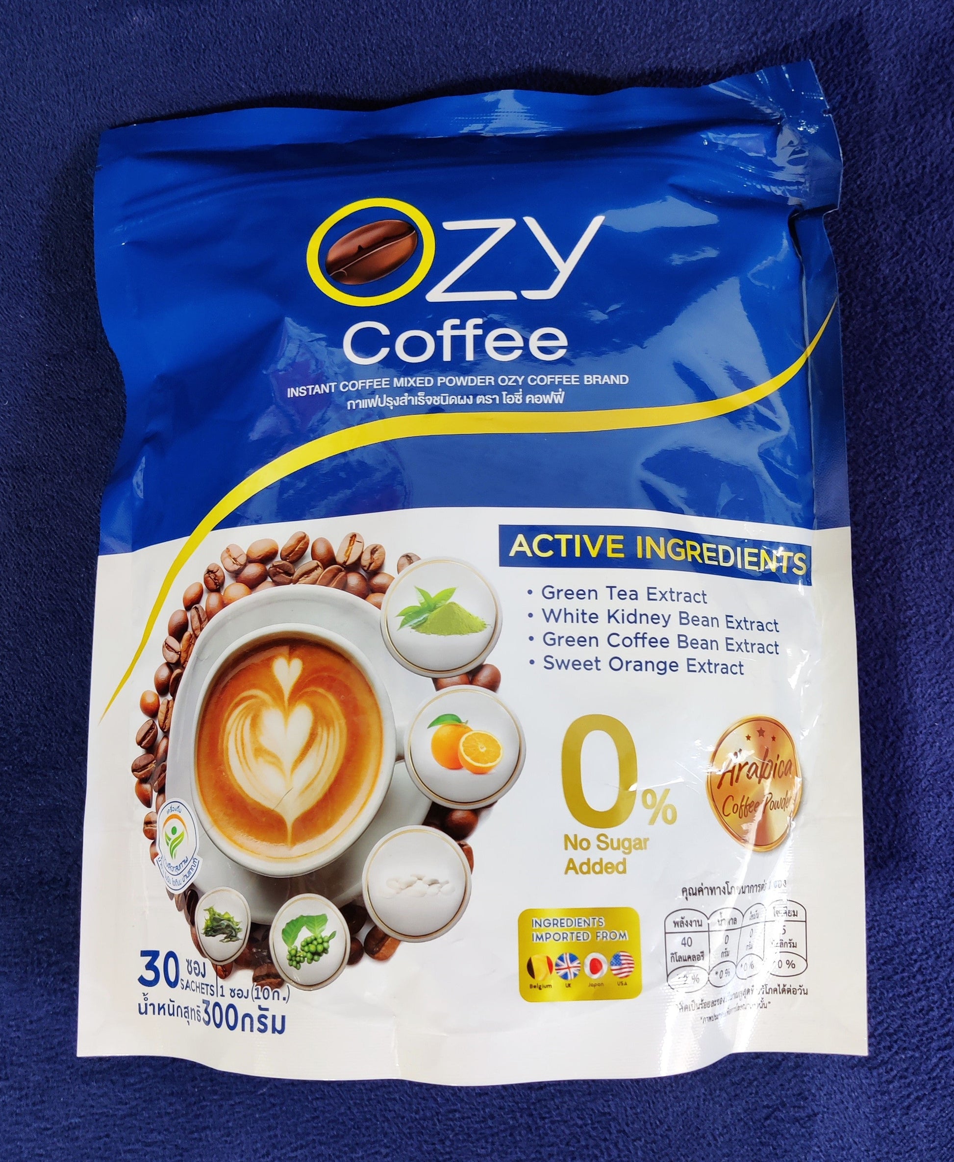 OZY Coffee package on a blue background