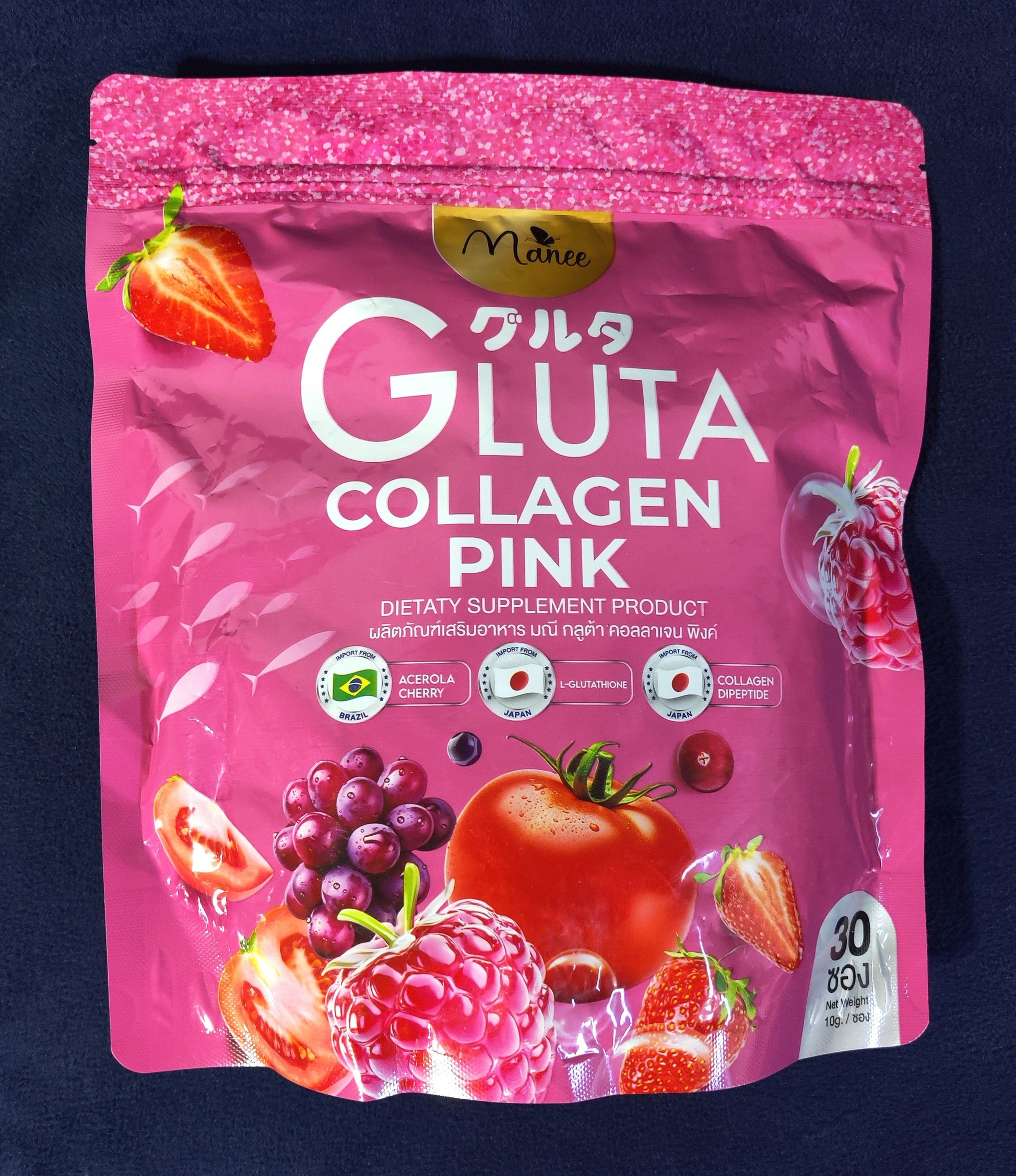 Pink package of Gluta Collagen Pink on a dark blue background